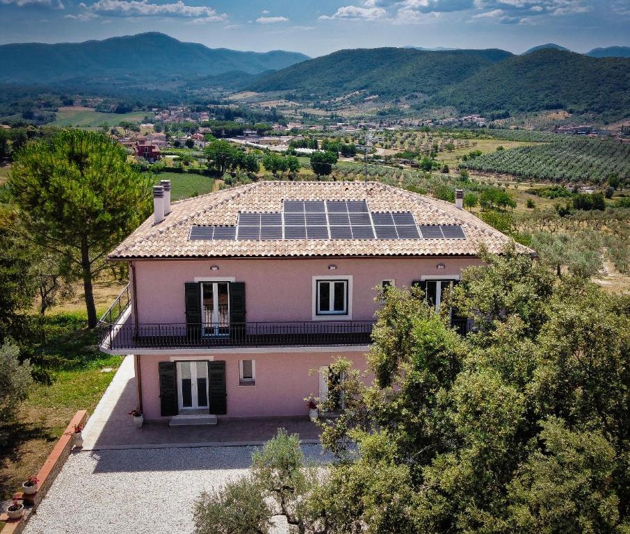 an image of a house with solar panels on the roof at La Sabinese in Frasso Sabino