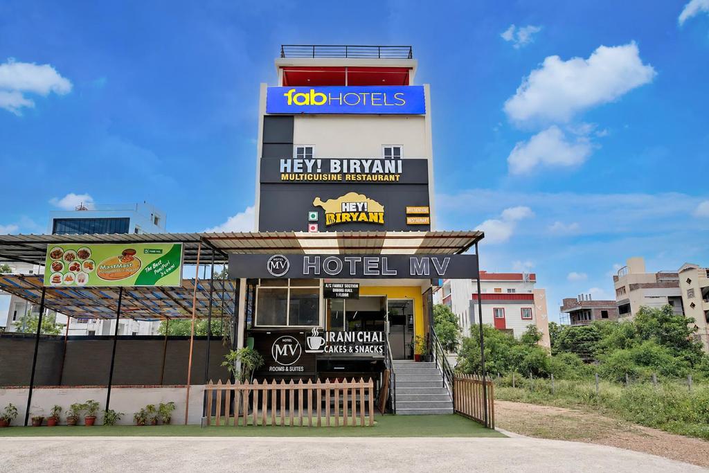 a hello biryani restaurant with a sign on top of it at FabHotel MV Luxury Rooms in Hyderabad