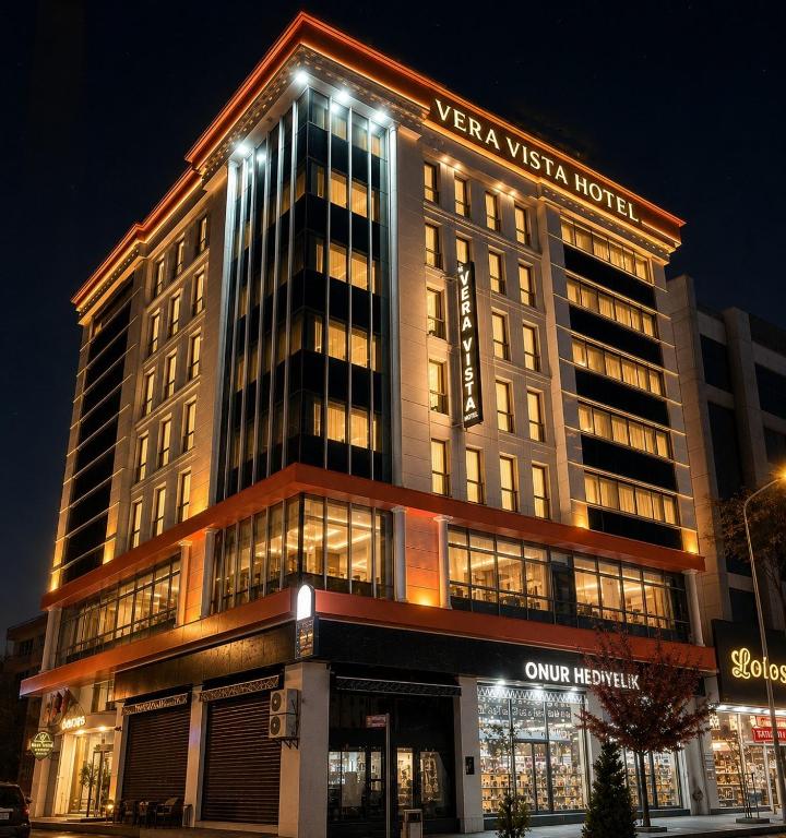 a building with lights on top of it at night at Vera Vista Hotel in Ipekyolu