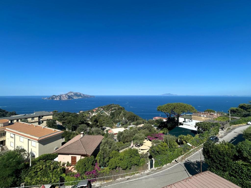 a view of the ocean from a house at Sunset Capri by Espresso Rentals in Massa Lubrense