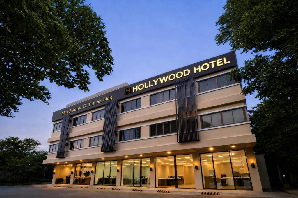 a building with a sign that reads holt wood hotel at Hollywood Hotel Puerto Princesa in Puerto Princesa City