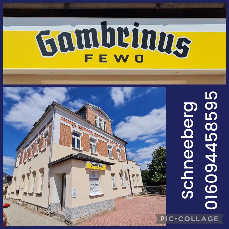 a sign for a building in front at Gambrinus Schneeberg in Schneeberg