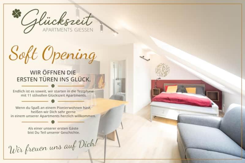 a bedroom with a bed and a sign that reads self opening at Glückszeit Apartments Gießen in Gießen