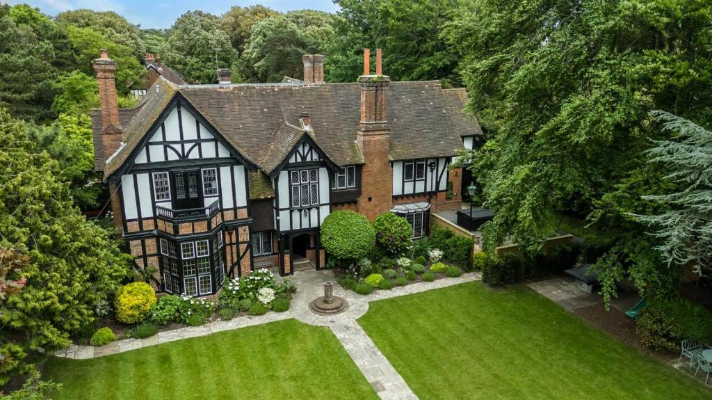 an aerial view of a house with a yard at 12 Bed in Bournemouth oc-t28236 in Bournemouth