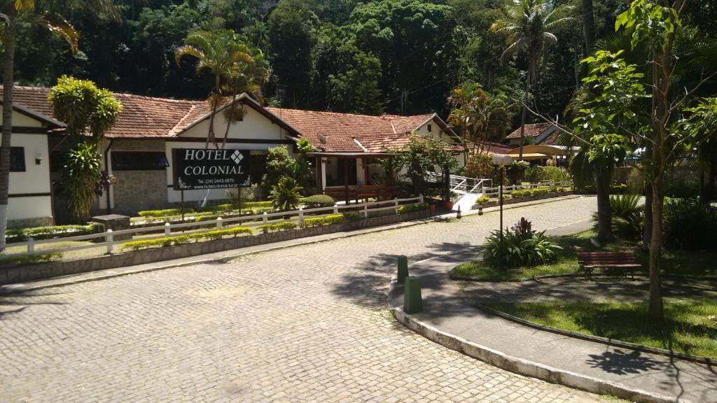 a cobblestone street in front of a building at Hotel Colonial in Piraí