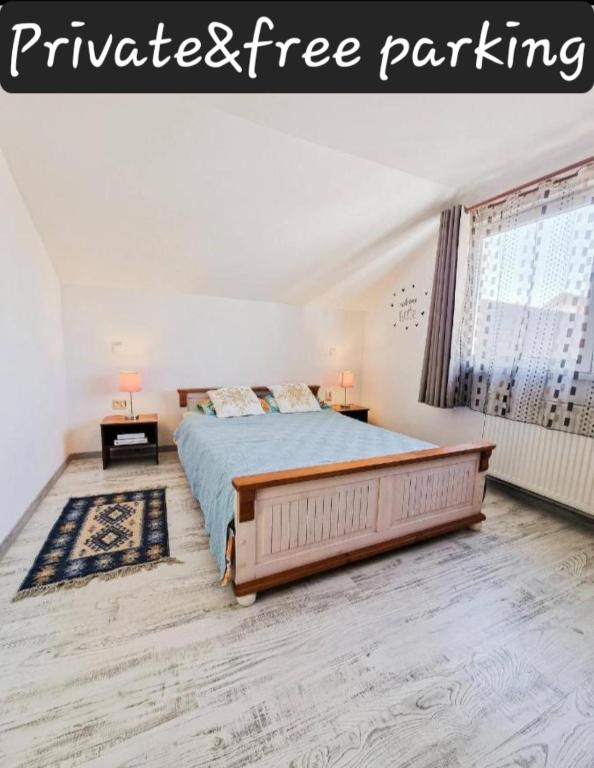 a bedroom with a bed with a mattress free parking at Perfekte Rast in Sibiu