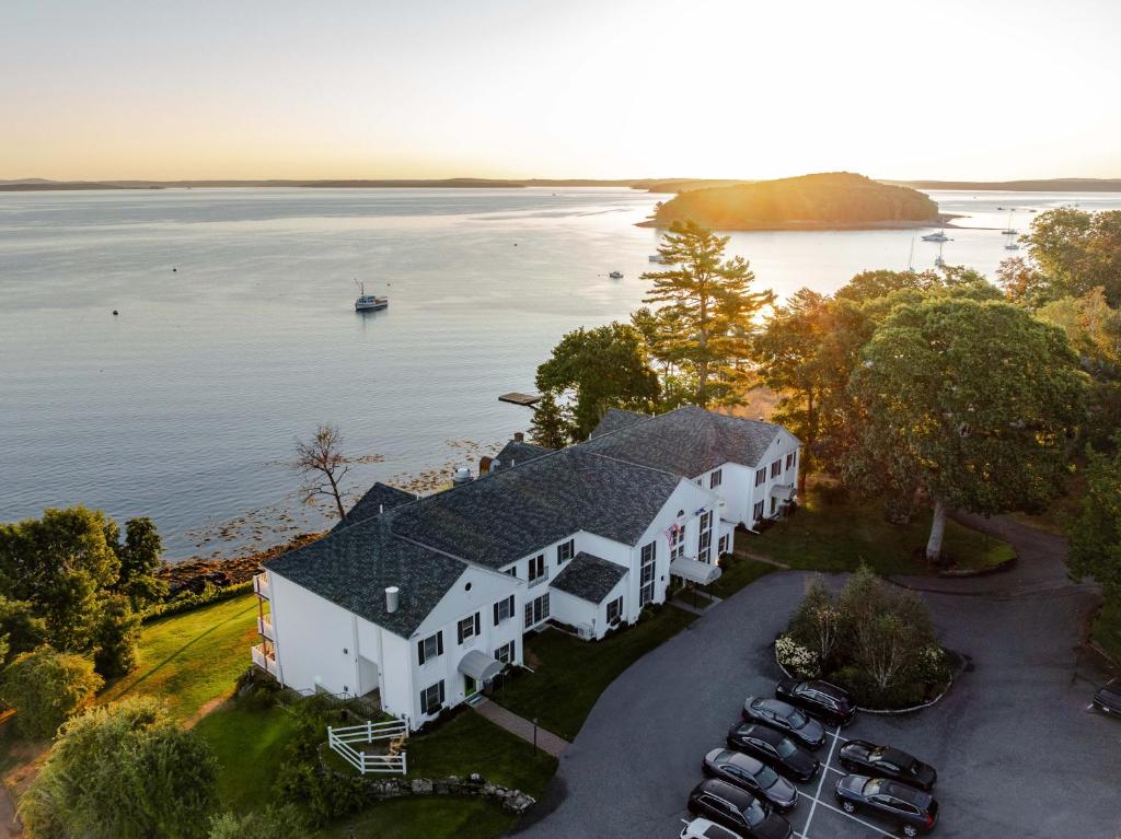 an aerial view of a house with a view of the water at Bayview Hotel in Bar Harbor