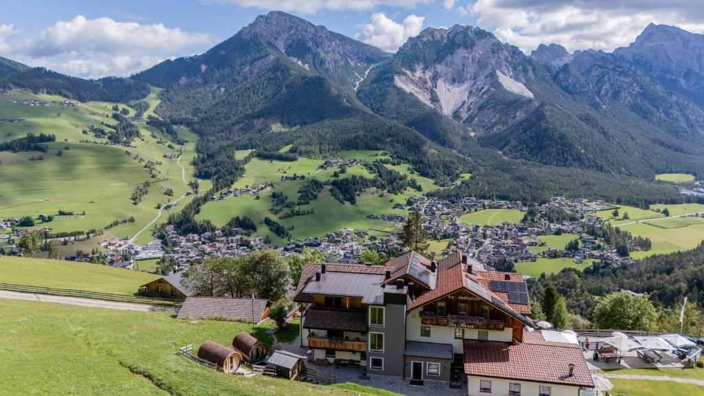 an aerial view of a village in the mountains at Rifugio La Para in San Vigilio Di Marebbe