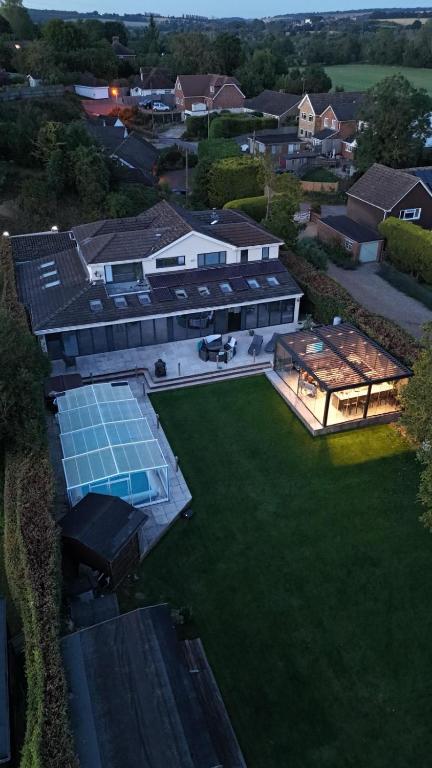 an aerial view of a large house with a yard at Architectural Gem with Luxury Outdoor Kitchen in Chilham