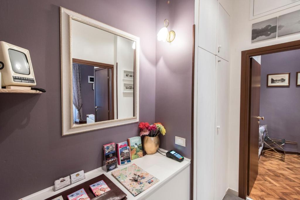 Televízia a/alebo spoločenská miestnosť v ubytovaní Vite Suites Guest House