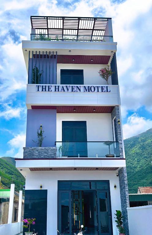 a building with a sign that reads the haven motel at The Haven Motel in Chú Cư