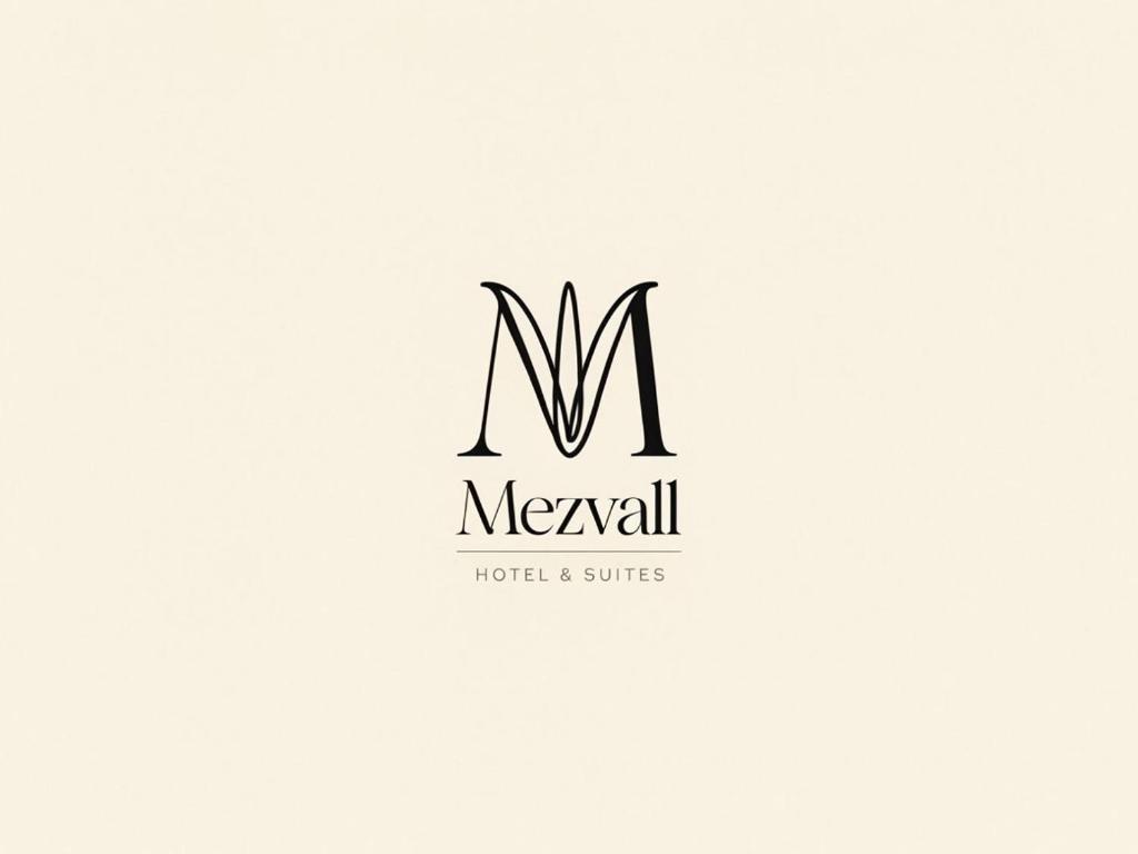 a logo for a hotel and suites at Hotel Mezvall in Morelia