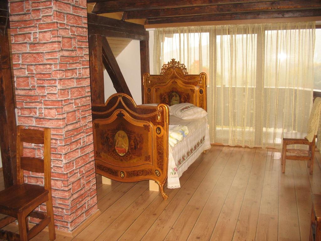 Postel nebo postele na pokoji v ubytování Pension Irina