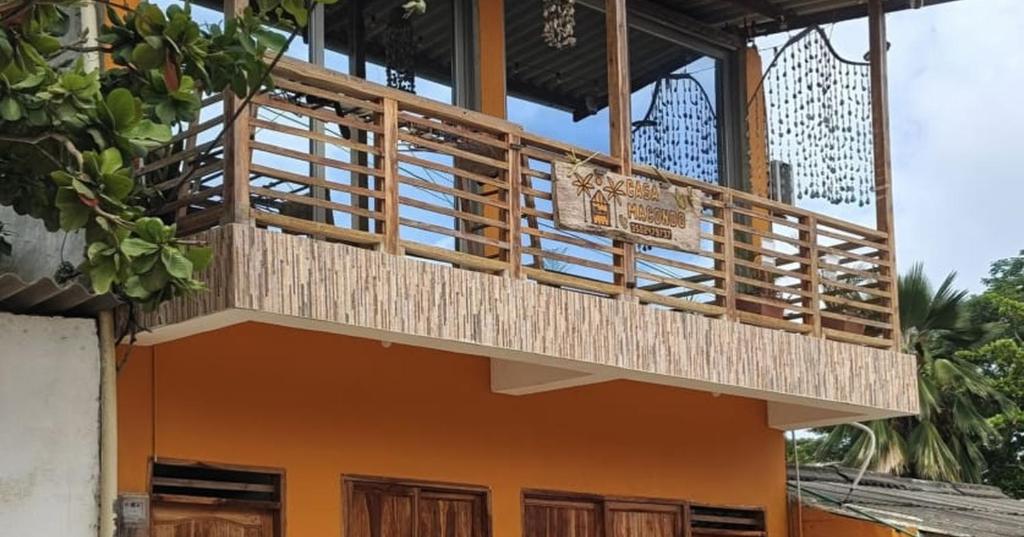 a balcony on the side of a house at Casa MACONDO BEACH HOUSE in Rincón