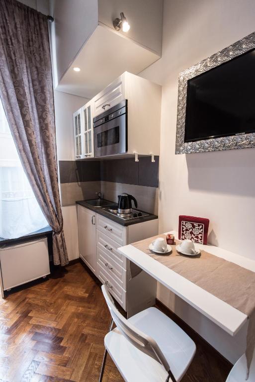 Kuchyňa alebo kuchynka v ubytovaní Vite Suites Guest House