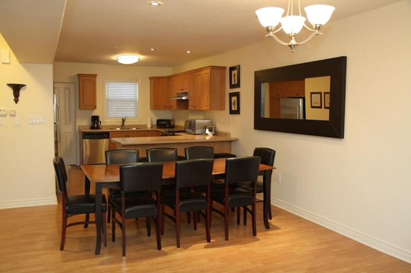 a dining room table and chairs in a kitchen at JACKSON HAVEN STAY in Jackson