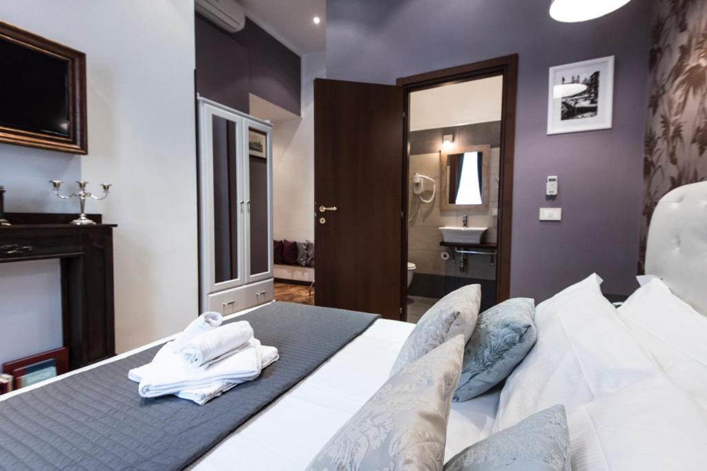 Posteľ alebo postele v izbe v ubytovaní Vite Suites Guest House