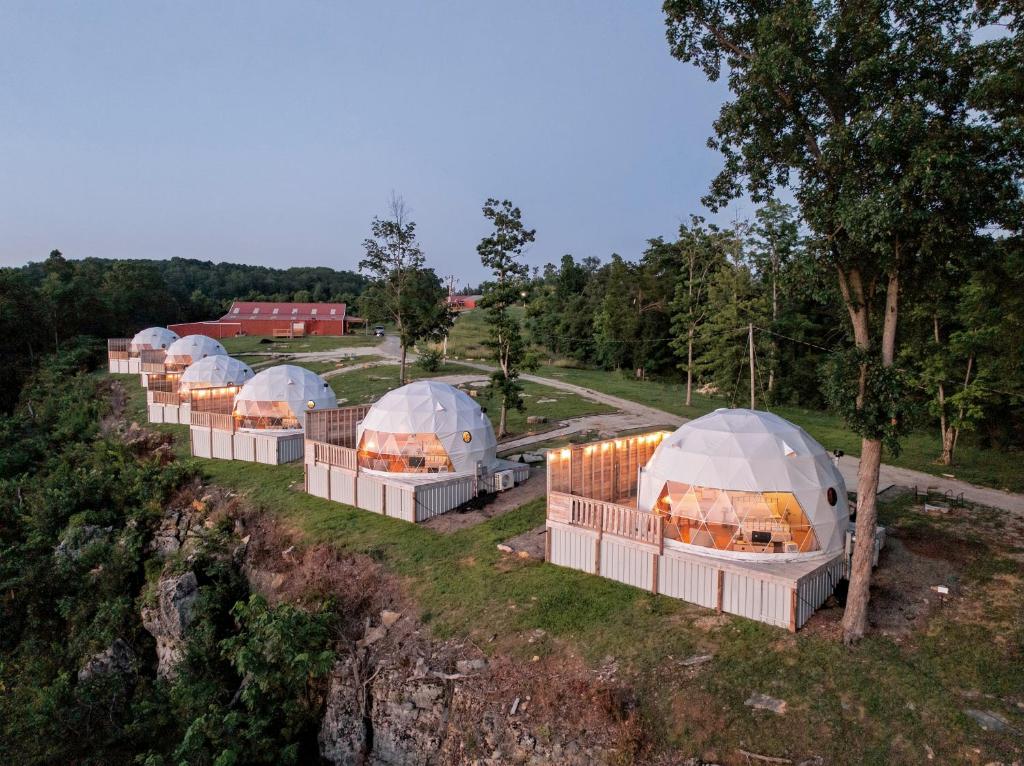 a row of domes on top of a hill at "Pineview Peak" The Overlook LUX Dome - RRG in Stanton