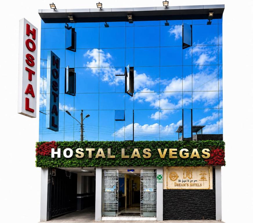 a hospital las vegas sign on the side of a building at hostal las vegas 3 in Quito