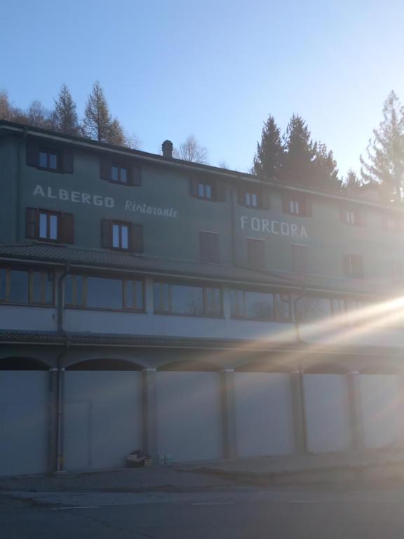 a building with the words albergo tortoria on it at Foresteria del Passo Forcora in Maccagno Superiore