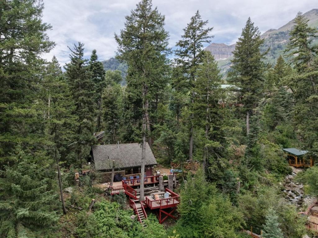 an aerial view of a house in the woods at Hideaway Above The Stream Sundance, Utah in Sundance