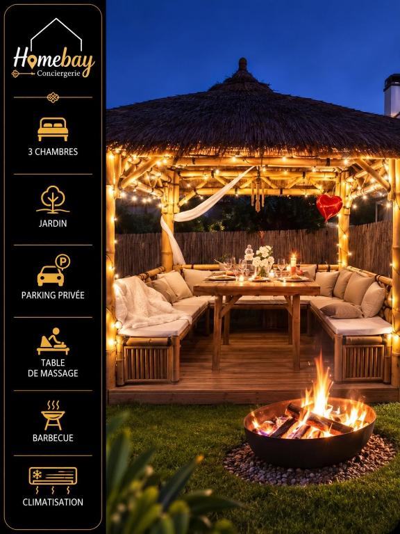 a gazebo with a table and a fire pit at Le Frais Jus in Fréjus
