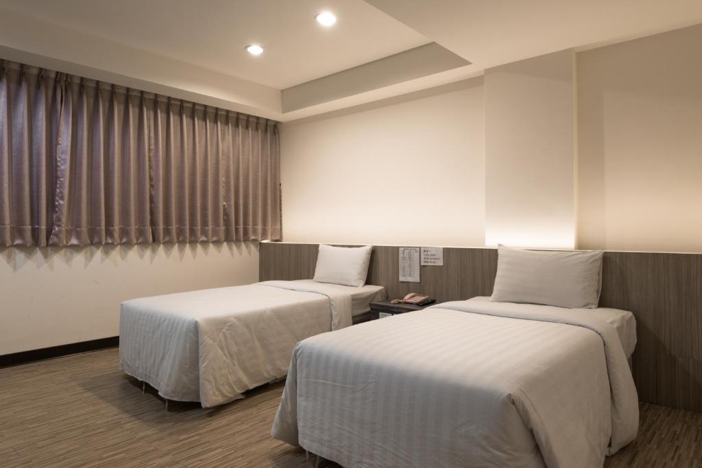 Lotus Yuan Business Hotel - Habitación Gemela