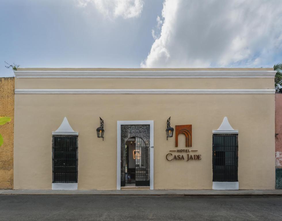a building with a sign that reads unite cason line at Casa Jade Hotel - Adults Only, Mérida in Mérida