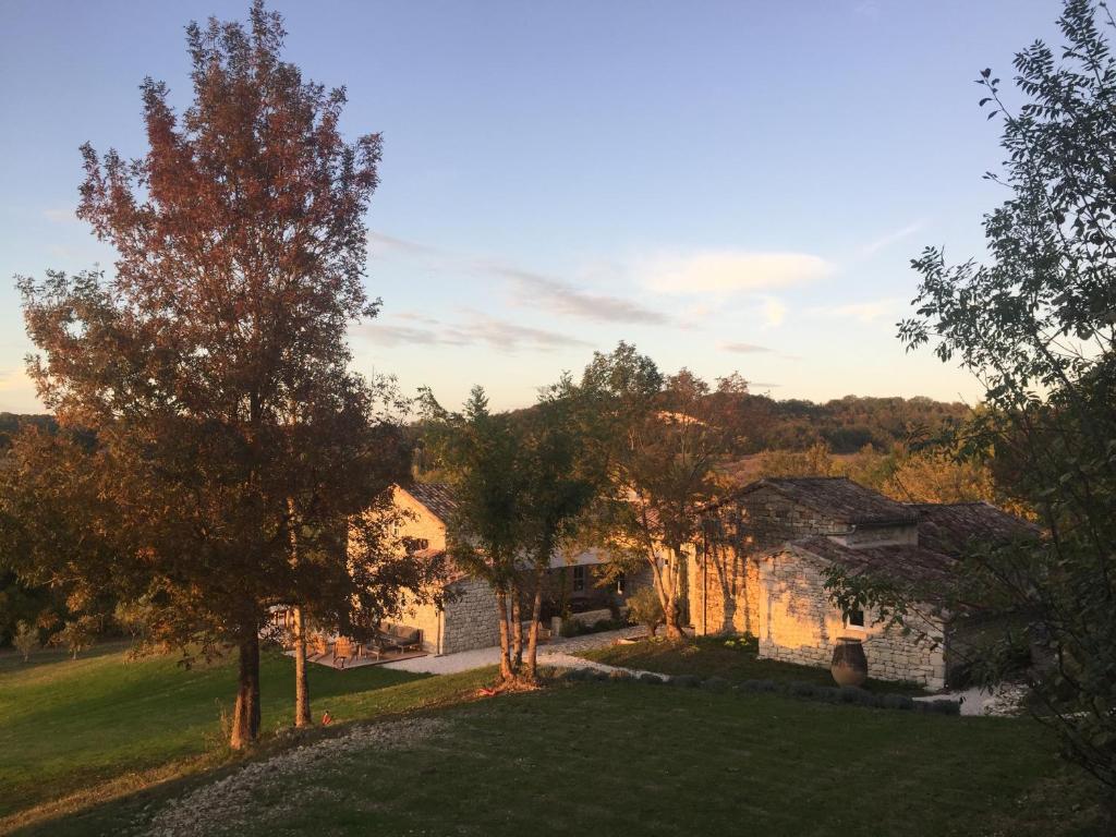 an aerial view of a house with trees at Maison Forte in Montcuq