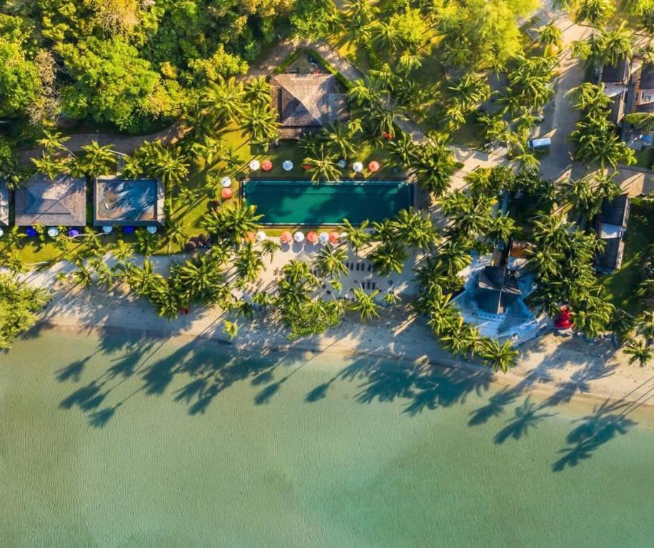 an aerial view of a resort with a swimming pool at Peninsula Beach Resort in Ko Chang
