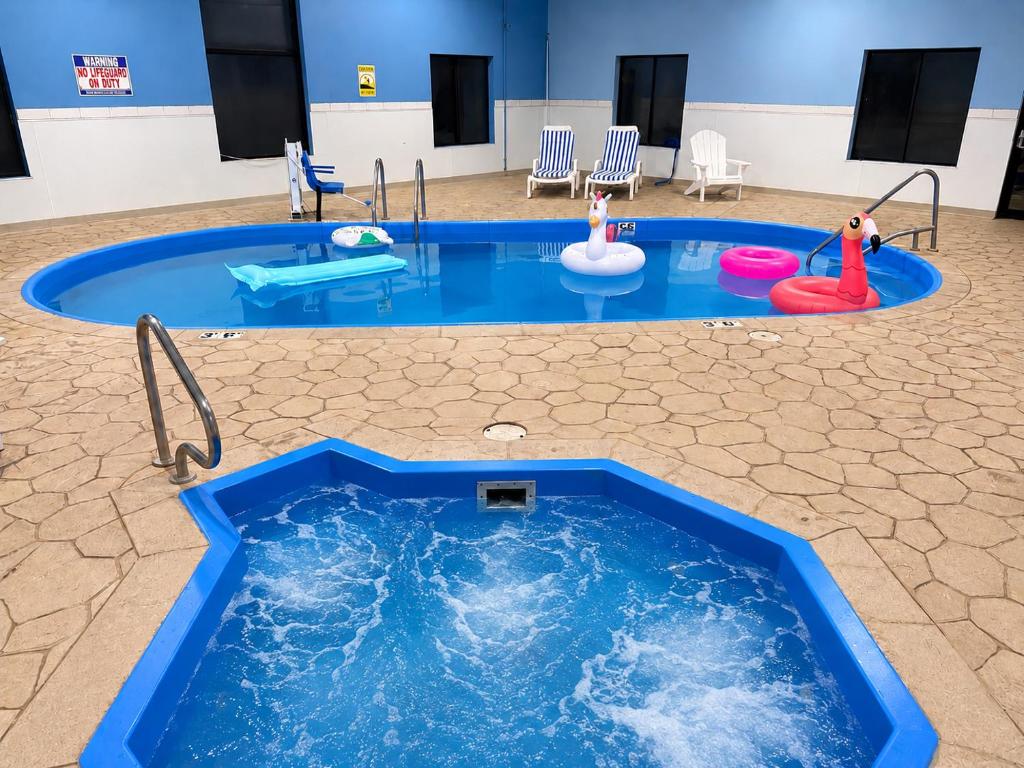 a large pool with inflatables in a room at Baymont by Wyndham Hot Springs in Hot Springs