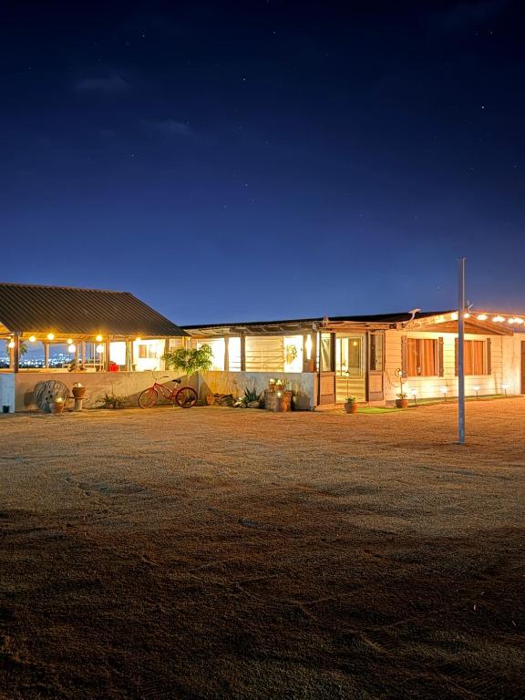 a house at night with the lights on at Casa Isabel in Ensenada