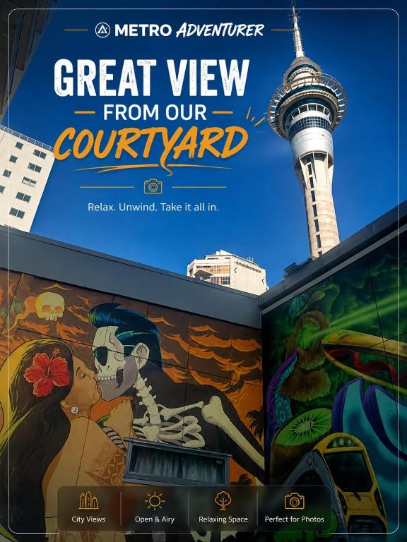 a poster for the great view from our germaneland in front of the tower at Metro Adventurer Backpackers in Auckland