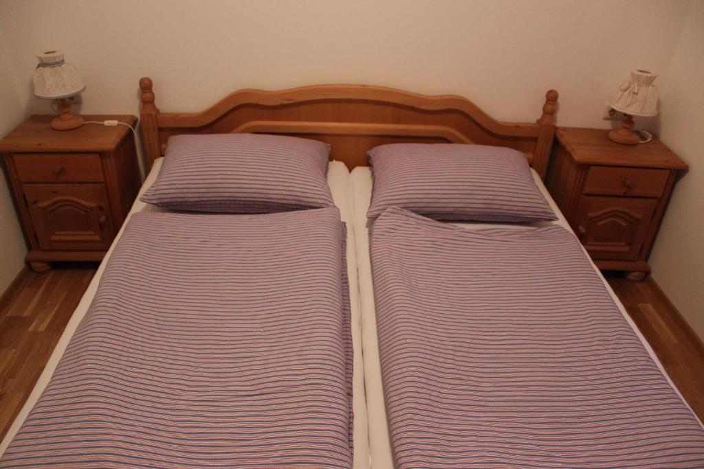 Postel nebo postele na pokoji v ubytování Haus Rathore