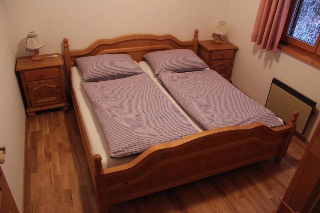 Postel nebo postele na pokoji v ubytování Haus Rathore