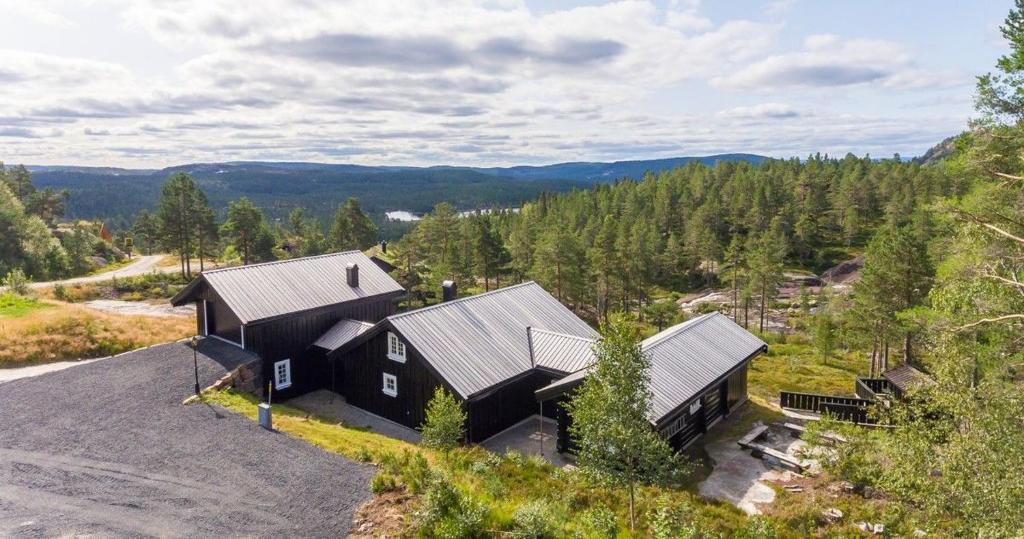 an aerial view of a house on top of a hill at Gamatun cabin in Heimdal