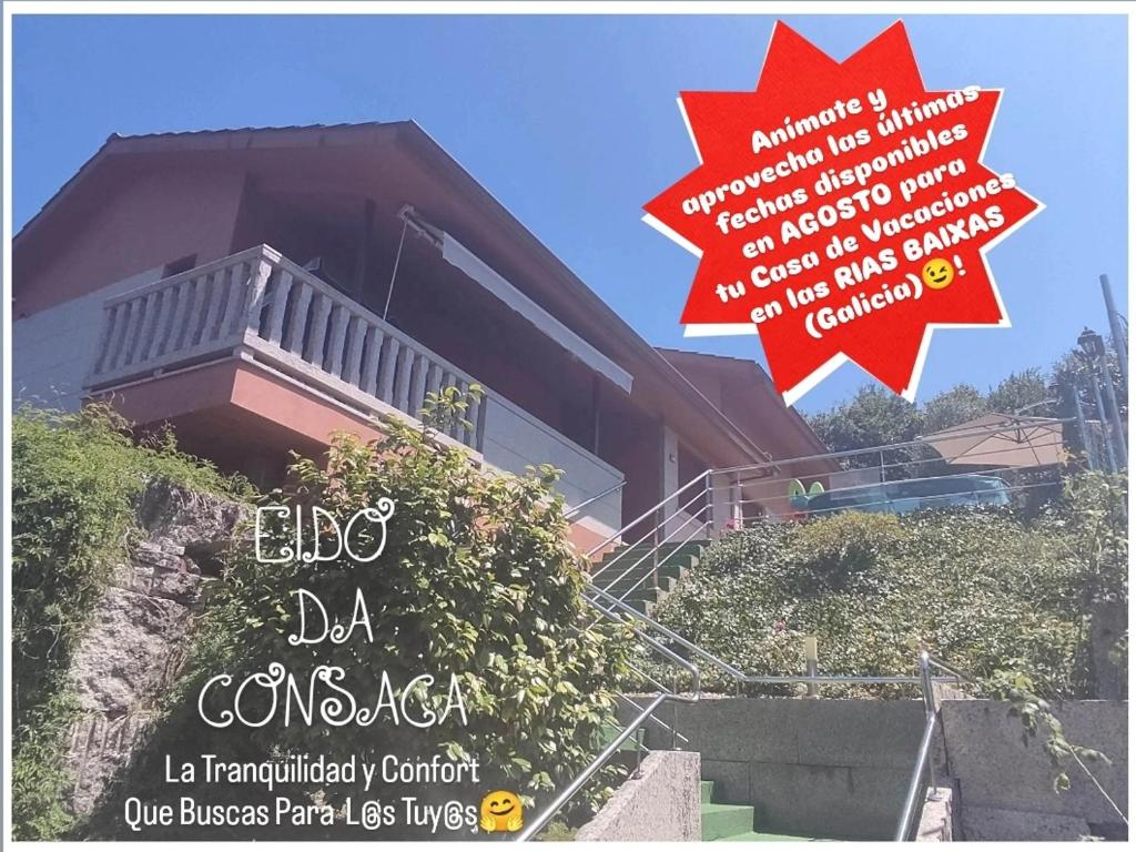 a sign in front of a building with stairs at Eido da Consaca in Ponteareas