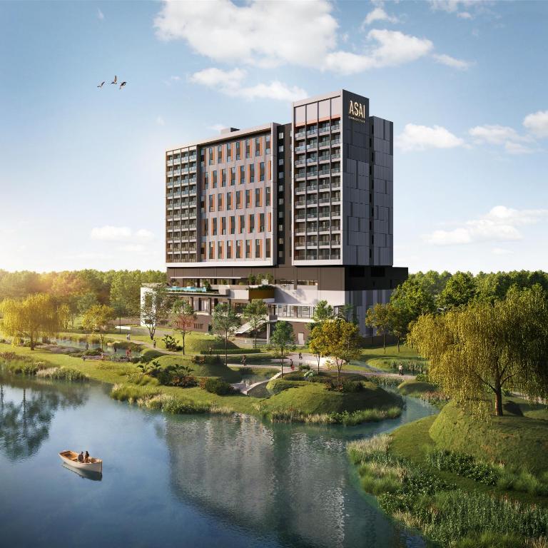 a rendering of a hotel with a boat in a river at ASAI Gamuda Cove in Banting