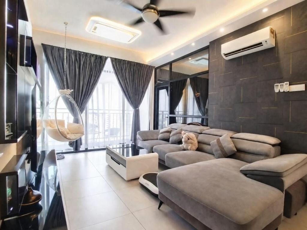 a living room with a large couch and a large window at 2BR Infinity Pool Condo Near Jonker 5Pax in Malacca