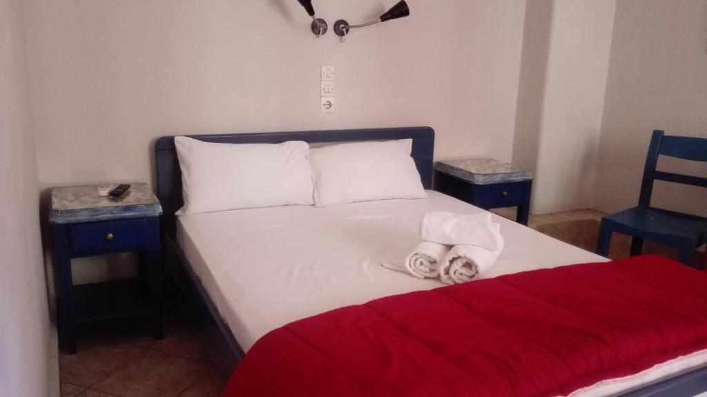 Postel nebo postele na pokoji v ubytování Hotel Ionion