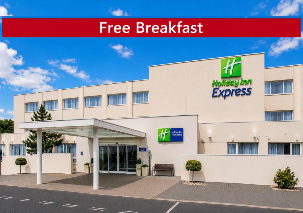 an image of a hospital building with a free breakfast at Holiday Inn Express Norwich by IHG in Norwich