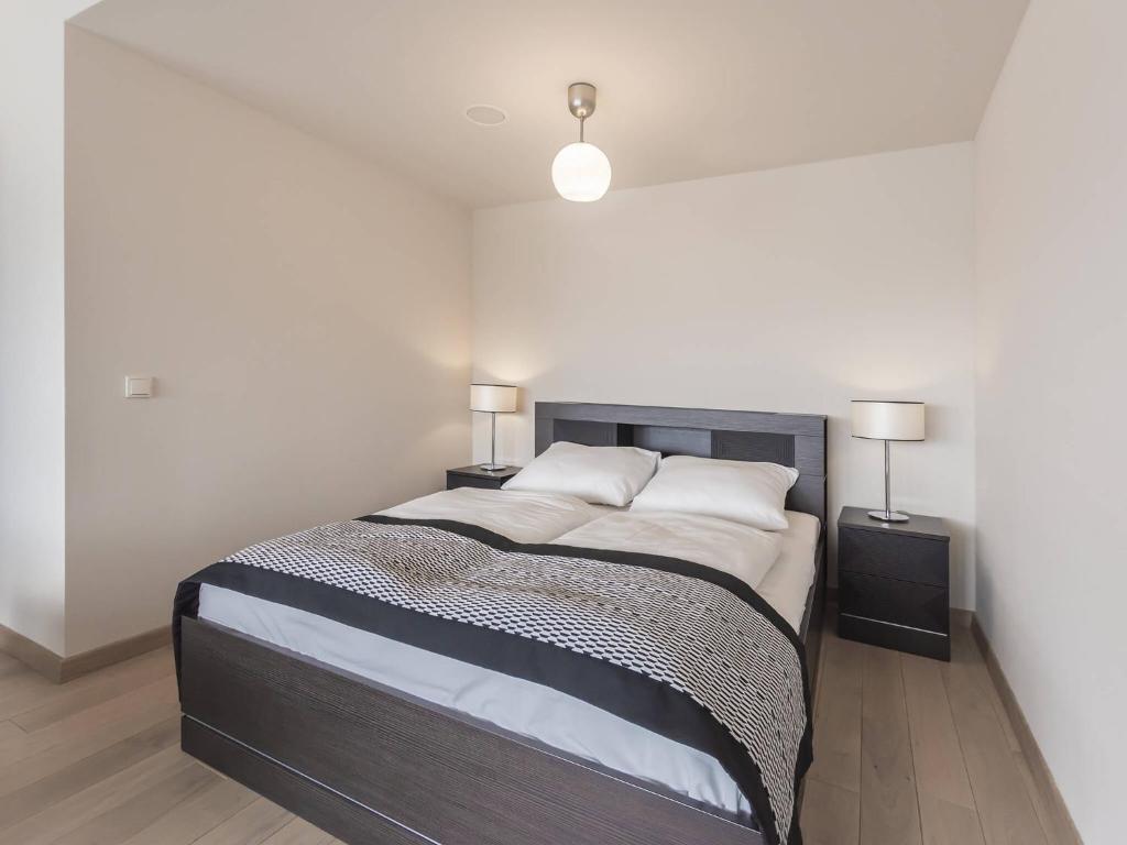 Posteľ alebo postele v izbe v ubytovaní VacationClub - Diune Apartment 502A