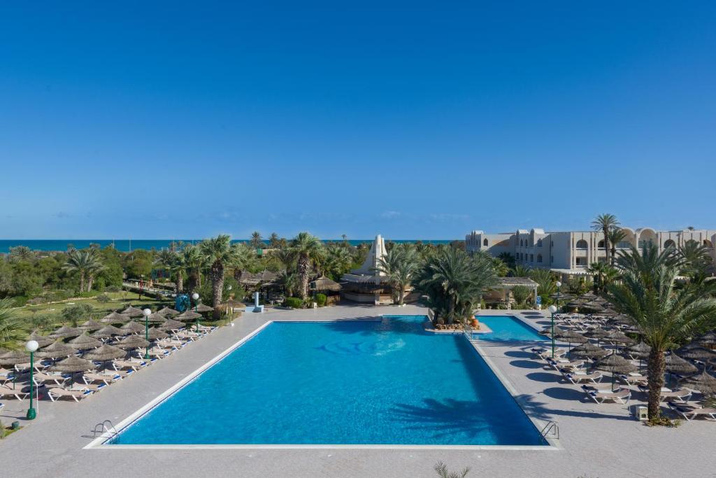 an image of a swimming pool at a resort at Iberostar Waves Mehari Djerba in Taguermess