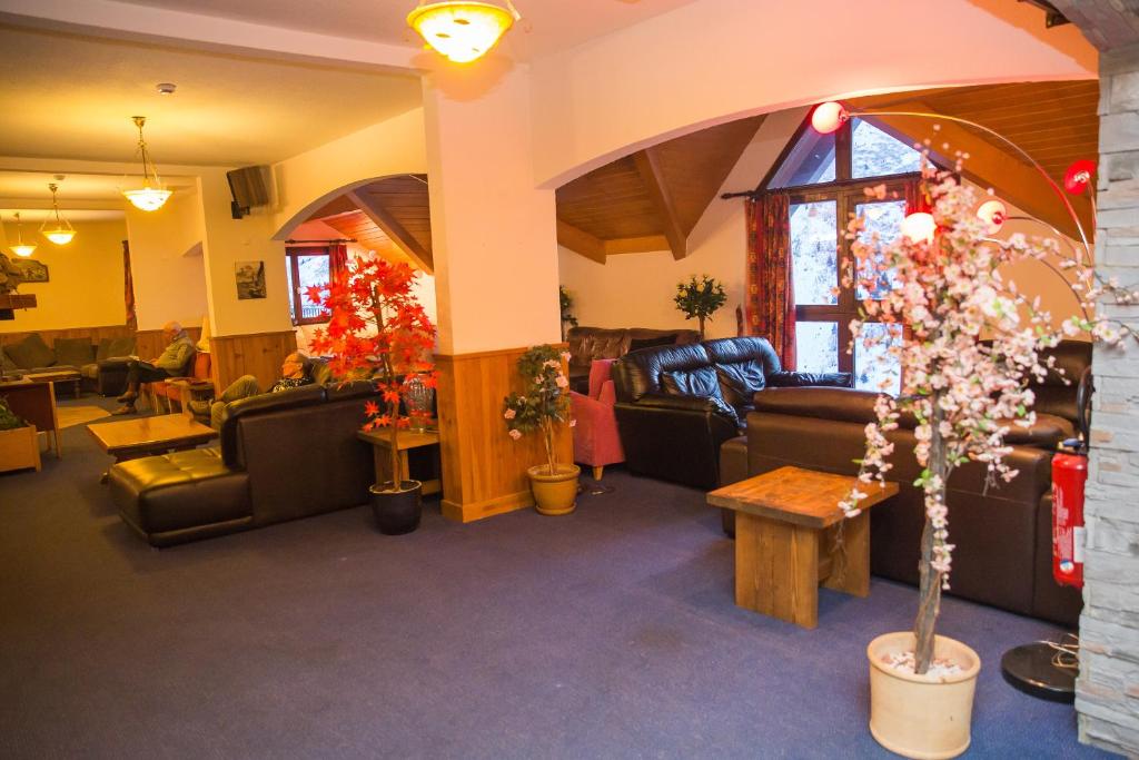 Posezení v ubytování Hotel l'Aigle