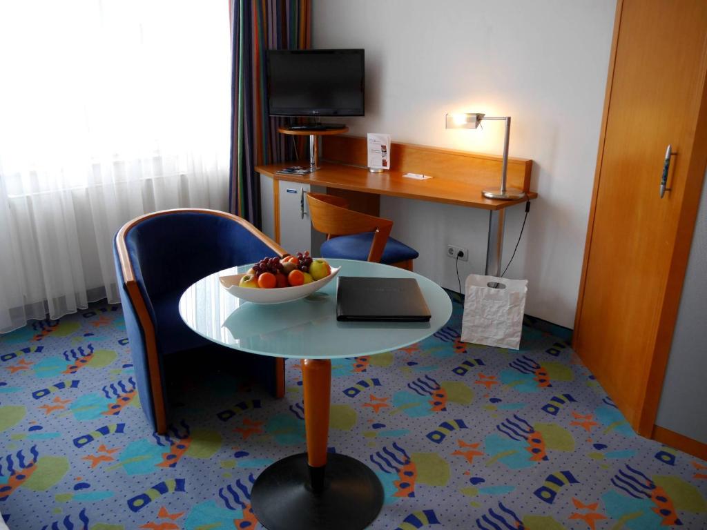 TV a/nebo společenská místnost v ubytování Business-Hotel Artes