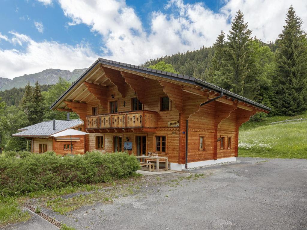 a log cabin in the middle of a forest at Chalet Dörfli by Interhome in Les Diablerets