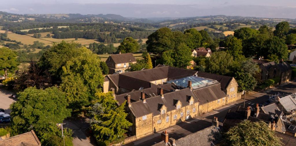 an overhead view of an old building in a village at Santo's Higham Farm Hotel in Alfreton