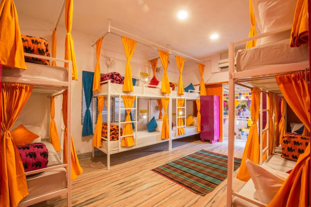 a room full of bunk beds in a hostel at goSTOPS Jaipur, Civil Lines in Jaipur