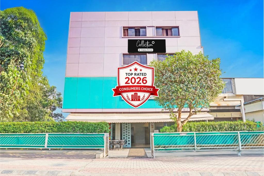 a building with a no taco zone sign on it at Super Collection O Pune Nagar Road Viman Nagar Formerly Ananta Sagar in Pune