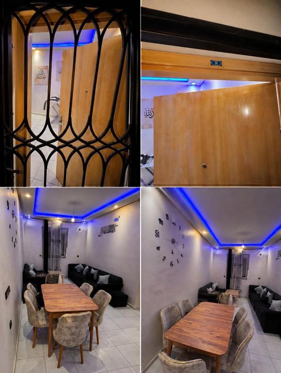 a dining room with a table and blue lighting at Dar M in Marrakesh